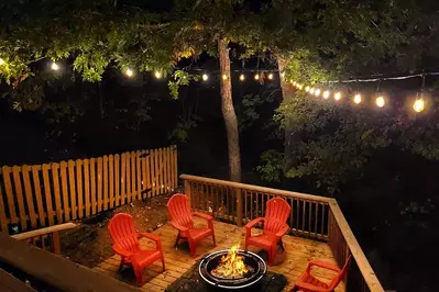 fire pit on deck of Smoky Mountain cabin at night