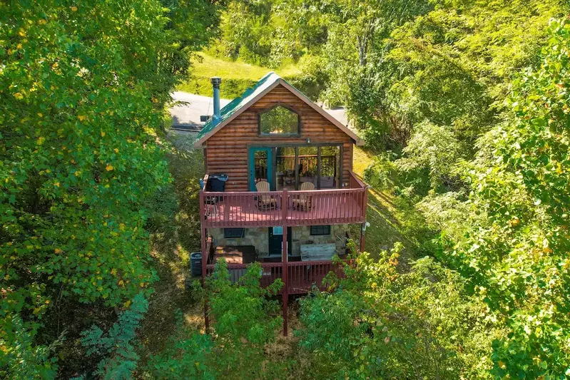 cabin in the smoky mountains surrounded by trees