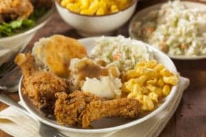Fried chicken, mashed potatoes, mac and cheese, cole slow, and a biscuit
