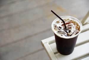 iced coffee in a cup with a straw
