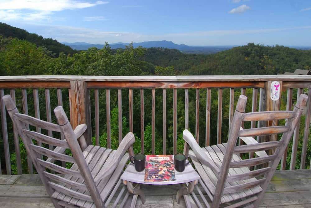 two chairs on deck of a honeymoon cabin